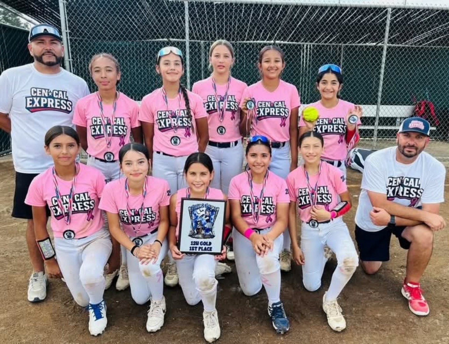 CenCal Express 12U Gold softball team with first-place award