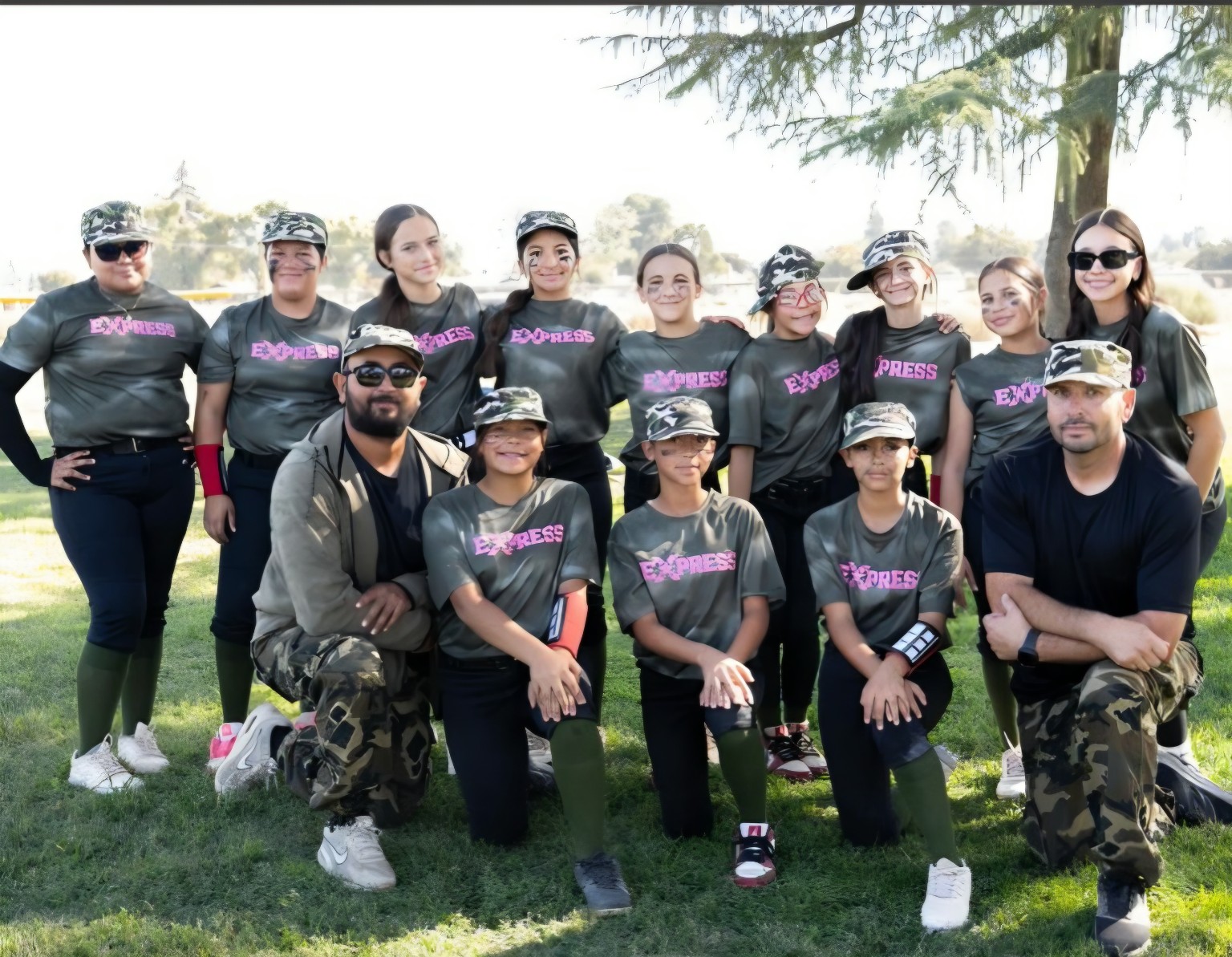 CenCal Express softball teammates in red and navy uniforms